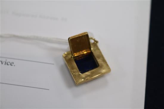 A yellow metal, lapis lazuli and two colour enamel locket pendant, 25mm.